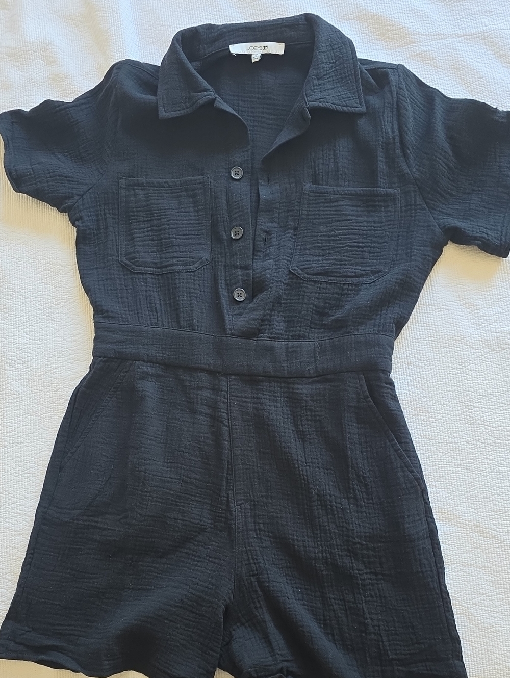 Women’s Navy Crinkle Textured Button Front Jump Suit.